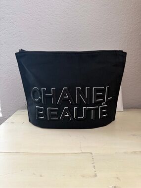 CHANEL Black Embossed 'CHANEL BEAUTÉ' Cosmetic Pouch